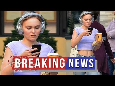  Lily-Rose Depp goes out braless and flashes tummy in crop top in NYC 